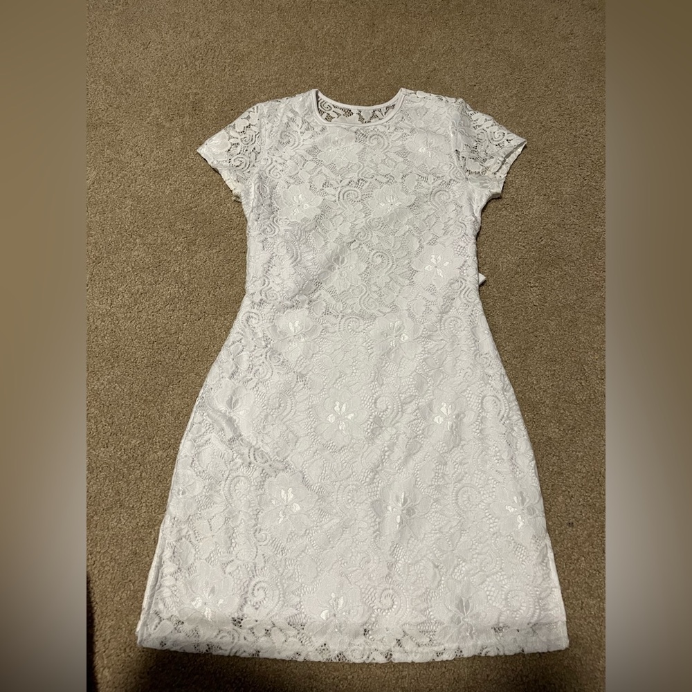white mini dress with open tie back